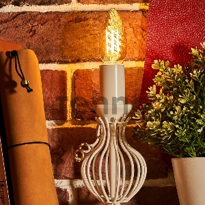 Лампа филаментная REXANT Витая свеча LCW35 9.5 Вт 950 Лм 2400K E14 золотистая колба