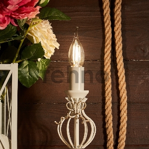 Лампа филаментная REXANT Свеча на ветру CN37 9.5 Вт 950 Лм 4000K E14 прозрачная колба