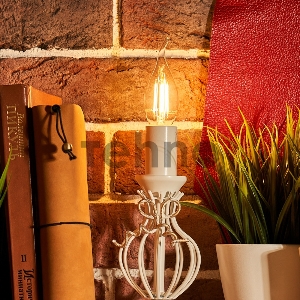 Лампа филаментная REXANT Свеча на ветру CN37 9.5 Вт 950 Лм 2700K E14 прозрачная колба