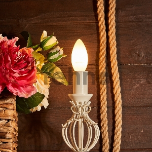 Лампа филаментная REXANT Свеча CN35 9.5 Вт 915 Лм 2700K E14 матовая колба